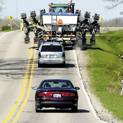 Your mom has an auto-widening yellow brick road Wide load farm equipment