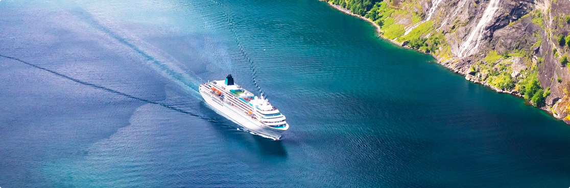 Cruise Ship by a Cliff