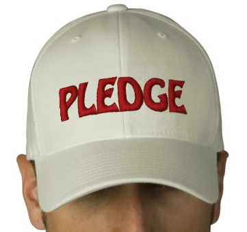It's a homophone! Also a homograph. Or possibly a polyseme? A person wearing a literal cap that says 'pledge'